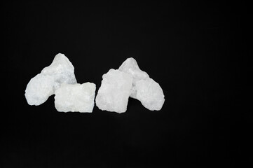 Alum stone isolated on black background..