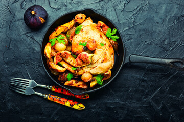 Chicken baked with potatoes and figs