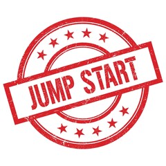 JUMP START text written on red vintage round stamp.
