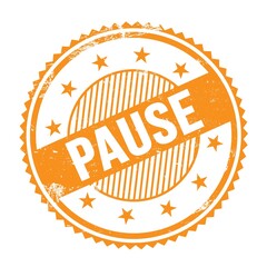 PAUSE text written on orange grungy round stamp.
