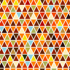 Seamless autumn pattern with abstract shapes in orange, yellow and beige colors