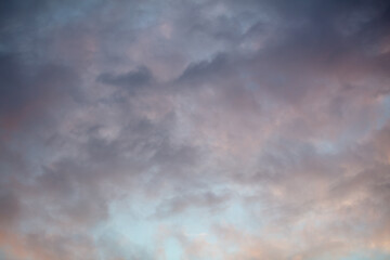 Rain clouds in the sky at sunset