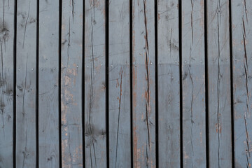 Wooden planks arranged in a vertical way to use as background