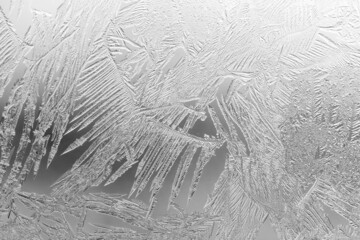 Patterns from frost on glass as a background.