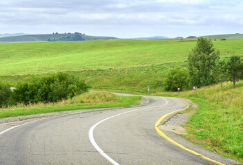 Fototapeta premium The bend of the highway in the foothills of the Altai