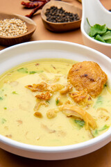 Nasi Soto Ayam or Soto Medan is  Traditional chicken soup with rice from Medan, North Sumatra. 

Soto is a traditional Indonesian soup mainly composed of broth, meat, fried patties and vegetables.