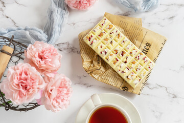 Craft chocolate with berries and nuts.