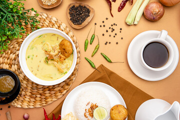 Nasi Soto Ayam or Soto Medan is  Traditional chicken soup with rice from Medan, North Sumatra. 

Soto is a traditional Indonesian soup mainly composed of broth, meat, fried patties and vegetables.