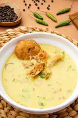 Nasi Soto Ayam or Soto Medan is  Traditional chicken soup with rice from Medan, North Sumatra. 

Soto is a traditional Indonesian soup mainly composed of broth, meat, fried patties and vegetables.