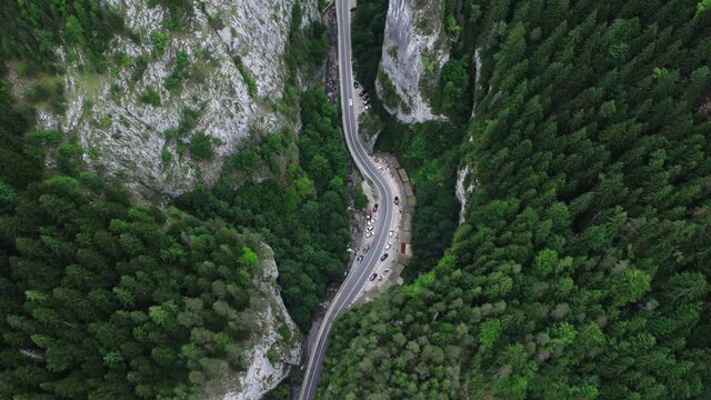 Aerial view of beautiful mountain road through rocks