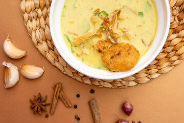 Nasi Soto Ayam or Soto Medan is  Traditional chicken soup with rice from Medan, North Sumatra. 

Soto is a traditional Indonesian soup mainly composed of broth, meat, fried patties and vegetables.