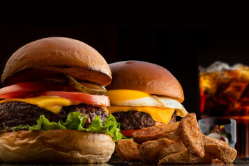 Two burger set meal in black background