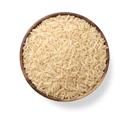 uncooked long brown rice in the wooden bowl, isolated on white, top view
