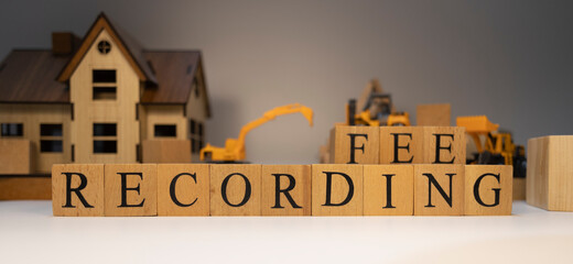 Recording fee was created from wooden cubes. Finance and Banking.
