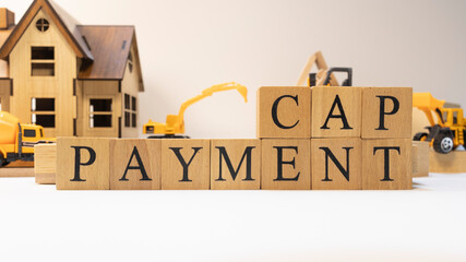 The Prepayment Cap was created from wooden cubes. Finance and Banking.