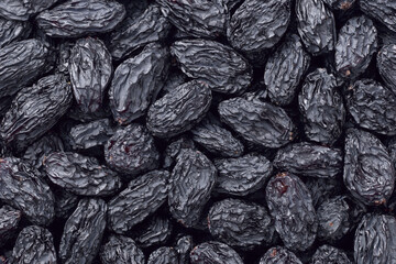 food backgrounds of black raisins, top view