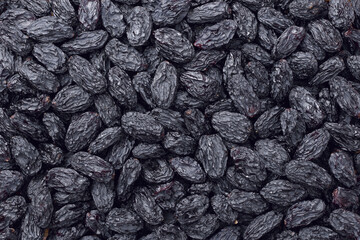 food backgrounds of black raisins, top view