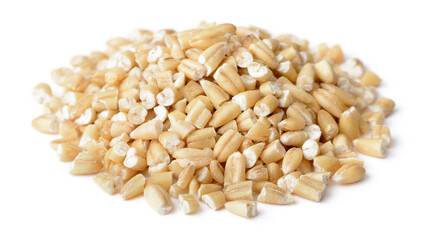 uncooked steel cut oats isolated on the white background