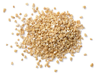 uncooked steel cut oats isolated on the white background, top view
