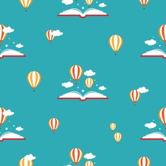 Seamless pattern with open books, air balloons and clouds on blue background.