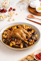 Stewed chicken soup with Chinese herbal medicine.  This soup very famous among chinese food and asian food as a healthy soup, food as medicine.