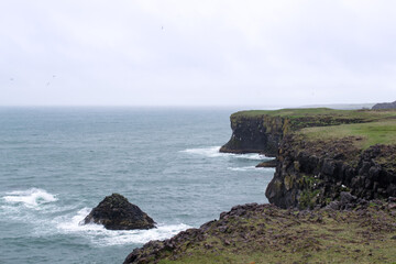 View of the fjords coastline at Snaefellsnes Peninsula, Iceland. Cloudy day during summer