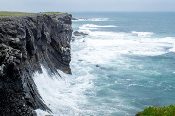 View of the fjords coastline at Snaefellsnes Peninsula, Iceland. Cloudy day during summer