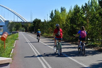 bike, bicycle, cycling, sport, road, family, cyclist, cycle, woman, riding, ride, park, summer, biker, child, biking, exercise, people, active, outdoors, nature, activity, couple, fun, sports