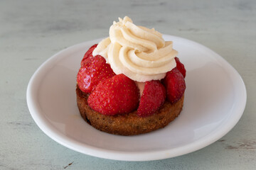 A strawberry tart with cream