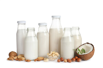 Vegan milk and different nuts on white background