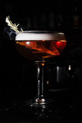 a beautiful alcoholic cocktail on the bar counter. alcoholic beverages