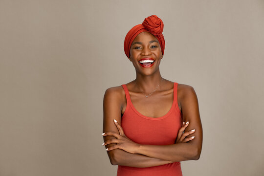 Beautiful african woman with headscarf laughing