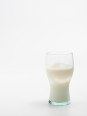 a cup of milk on white background