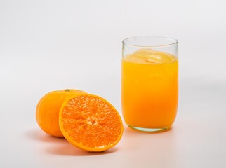 orange juice in clear glass with orange fruit. Freshness and healthy concept.
