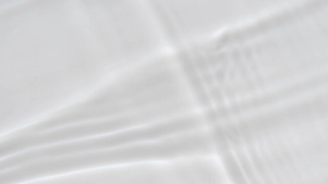 water waves splash on white background in slow motion. Video Clip stock footage.