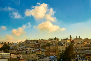 Fototapeta na wymiar sunrise over the ancient rooftops of the old city of jerusalem, israel