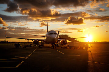 Commercial airplane in an airport before people boarding