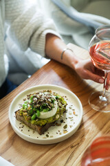 Healthy avocado toast with cheese and seeds