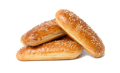 baked oblong sesame hot dog bun isolated on white background