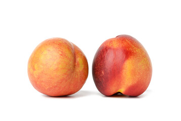 ripe round red nectarine isolated on white background, tasty and healthy fruit, close up