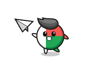 madagascar flag badge cartoon character throwing paper airplane