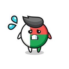 madagascar flag badge mascot character with afraid gesture