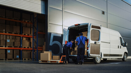 Outside of Logistics Distributions Warehouse With Manager Using Tablet Computer, Workers Start Loading Delivery Truck with Cardboard Boxes. Online Orders, Purchases, E-Commerce Goods. © Gorodenkoff