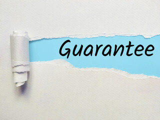 guarantee letters on ripped paper