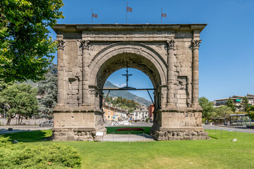 Fototapeta premium The ancient Arch of Augustus in the historic center of Aosta, Italy, on a sunny day