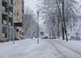 WINTER ATTACK - Traffic on the streets of a snow covered winter city 
