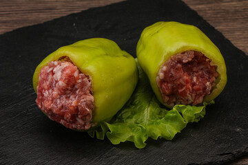 Raw stuffed bell pepper with meat