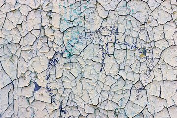 Old cracked paint texture. Burnt paint. The surface is worn out.