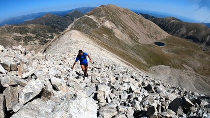 young man hiking in the mountains