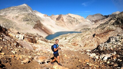 Fototapeta premium young man hiking in the mountains